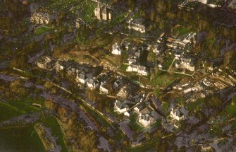 Oblique aerial view centred on Inveresk Gate, church and burial-ground, taken from the SE.