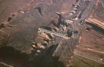 Oblique aerial view centred on the quarry, taken from the SSE.