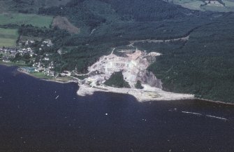 Oblique aerial view centred on the quarry and pier, taken from the SE.