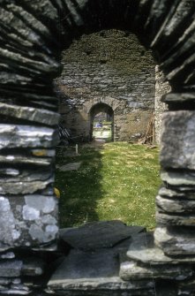Excavation of cross-base, Kilnave Church, Kilnave.
View through window in East gable through West door towards excavation.
