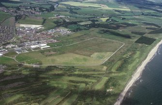 Montrose Airfield, oblique aerial view, taken from the SE, centred on the airfield and aircraft hangars.
