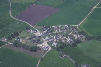 Oblique aerial view centred on the village of Fowlis Wester, taken from the NE.