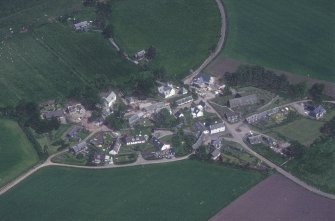 Oblique aerial view centred on the village of Fowlis Wester, taken from the SW.