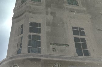 Glasgow, 355-429 Eglinton Street.
Detail of first floor windows and street sign.