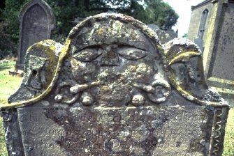 Detail of headstone to David Brown d. 1743 with Green Man, Menmuir Parish Churchyard.