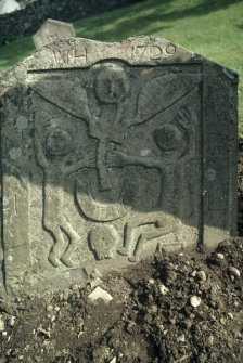 View of headstone to W H 1729 with primitive resurrection scene, Forteviot Parish Church burial ground.