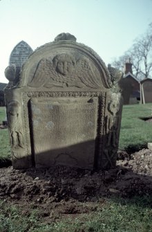 View of headstone to Kinninmount children1748 with winged soul, skeletons, Inchture Churchyard