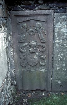 View of  headstone with trumpeting angels and heraldic shield, Monzie Parish Church burial ground.