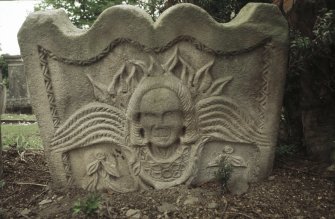 Detail of headstone with winged skull, St Madoes Parish Church burial ground.