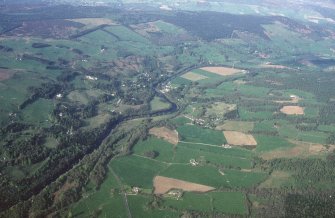 General oblique aerial view looking over Strathtay towards Pitlochry and the Grampian mountains, taken from the SSW.