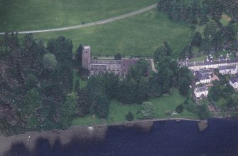Oblique aerial view centred on Dunkeld cathedral, taken from the S.