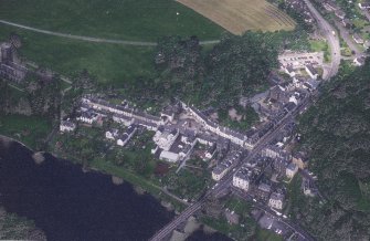 Oblique aerial view centred on the town of Dunkeld with road bridge and cathedral adjacent, taken from the SE.
