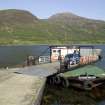 Ferry and slipway. View from E