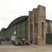 View of First World War hangar at RAF Leuchars. Coupled General Service Shed showing gable end, doors and brick piers from N.