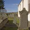 Churchyard. Pictish cross slab. Location view from SE
