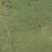 Oblique aerial view centred on the remains of the recumbent stone circle, taken from the SW.