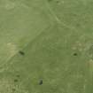 Oblique aerial view centred on the remains of the recumbent stone circle, taken from the NE.