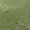 Oblique aerial view centred on the remains of the recumbent stone circle, taken from the NNE.