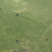 Oblique aerial view centred on the remains of the recumbent stone circle, taken from the N.