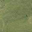 Oblique aerial view centred on the remains of the recumbent stone circle, taken from the SW.