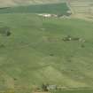 General oblique aerial view of the remains of the recumbent stone circle, taken from the SSE.