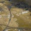 Oblique aerial view of the village, the railway and the remains of the field banks, taken from the ENE.