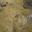 Oblique aerial view of the field banks and lazy beds with the village adjacent, taken from the N.