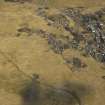 Oblique aerial view of the field banks and lazy beds with the village adjacent, taken from the S.