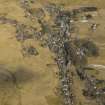 Oblique aerial view of the village and the remains of the field banks and lazy beds, taken from the S.