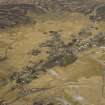 Oblique aerial view of the village and the remains of the field banks and lazy beds, taken from the SE.