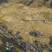 Oblique aerial view of the village and the remains of the field banks and lazy beds, taken from the ESE.