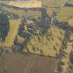 General oblique aerial view of the policies, country house and church, taken from the NE.