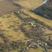 General oblique aerial view of the country house and church, taken from the W.