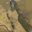 Oblique aerial view of the remains of the cultivation terraces, taken from the SW.