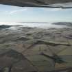 General oblique aerial view looking across the Gelly Burn and Cleish Hills in fog, taken facing West.