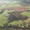 General oblique aerial view of the abbey, country house and towerhouse, taken from the NE.
