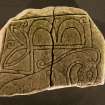 View of reverse of Strathmartine no 3 cross-slab fragment. showing Pictish symbols