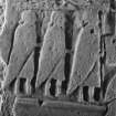 Face B. detail showing 3 figures with cloaks (B&W)