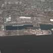 General oblique aerial view of Dundee centred on the docks, taken from the SSE.