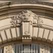 Detail of carved lion over keystone above W entrance