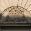 Detail of carved tympanum above doorway on Grindlay Street