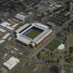 Oblique aerial view of the football stadium, taken from the WSW.