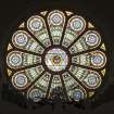 Interior. Detail of W stained glass rose window