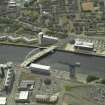 Oblique aerial view of the bridge under construction, taken from the NNE.