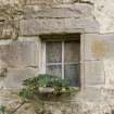 Detail of window and inscribed lintel 'M N N K'