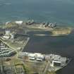 Oblique aerial view of the docks, mills and shopping centre, taken from the SE.