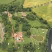 Oblique aerial view centred on the house, taken from the SW.