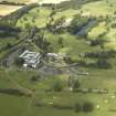 General oblique aerial view of the country house hotel, farmsteading, stables and golf course, taken from the SW.