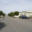 View.  Main road in tecnical site to rear of Bellman type aircraft hangars.