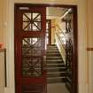 Interior. Ground floor, backstage, view of double door and stair leading to exit